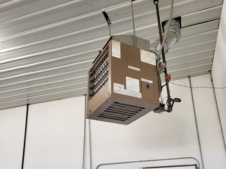 Unit heater hanging from the hangar ceiling