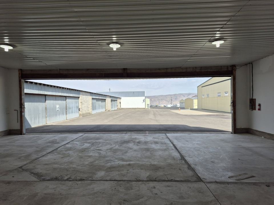 View from inside the hangar through the open door
