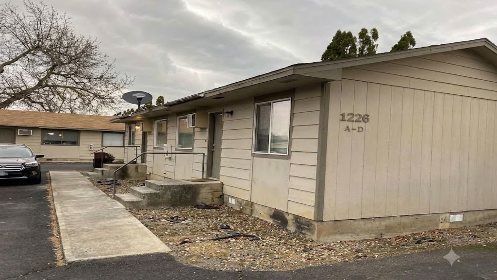 Single-story building marked 1226 A to D on Burrell Avenue