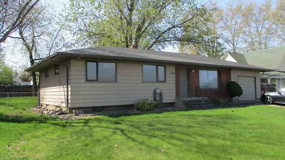 Single-family home at 506 Warner with a front lawn and garage