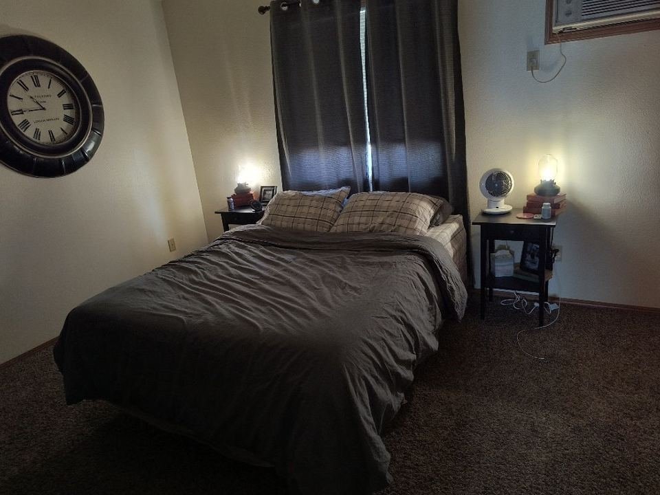 Bedroom with a large window